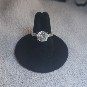 Silver plated beveled round cubic zirconia ring